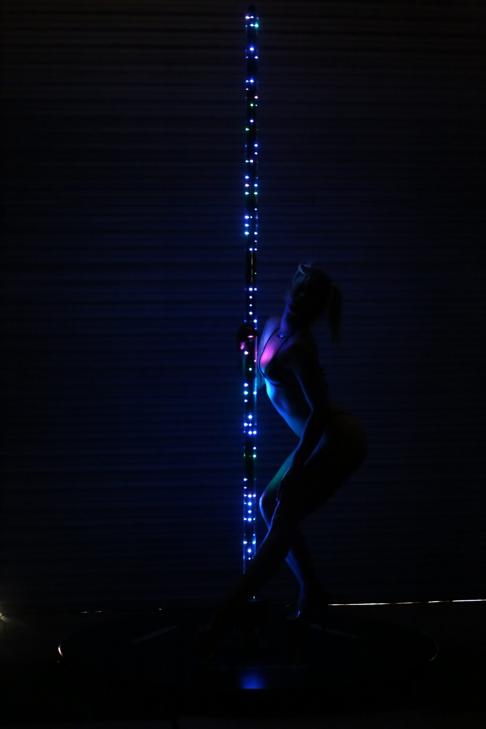 Portable LED dance pole with freestanding base